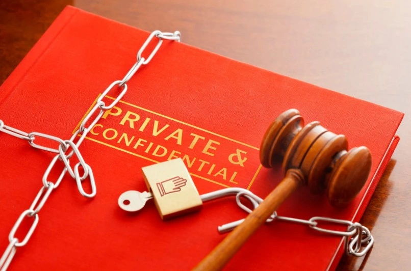 Confidential legal document secured with chain and gavel representing protection of personally identifiable information Bibiyan Law Group